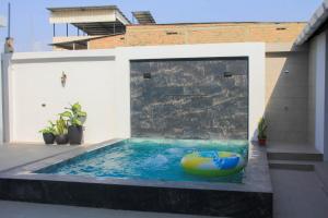 Bazén v ubytování Casa vacional de playa Santorini nebo v jeho okolí