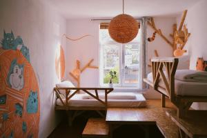 Postel nebo postele na pokoji v ubytování Hostel & Garten Eden
