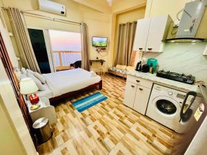 Köök või kööginurk majutusasutuses Aizawl Guest House Apartments