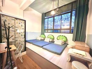 Katil atau katil-katil dalam bilik di East Coast Coffee Inn