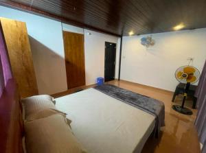 Postel nebo postele na pokoji v ubytování Tjmaryland villa + 2 fotografie