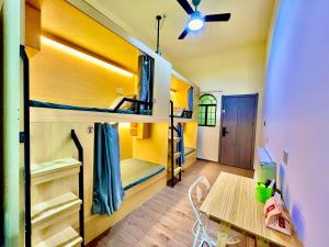 Katil atau katil-katil dalam bilik di East Coast Coffee Inn
