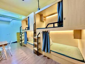 Katil atau katil-katil dalam bilik di East Coast Coffee Inn