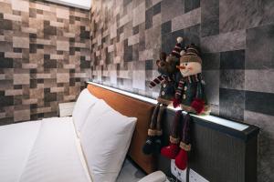 Letto o letti in una camera di Hotel Puri Taipei Station Branch