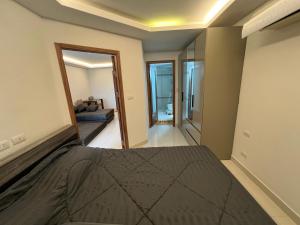 Giường trong phòng chung tại Club Royal Wongamat Pattaya