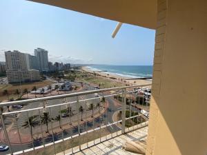 a view of the beach and the ocean from a building at Chasing The Sun in Durban