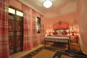 Cama o camas de una habitación en Riad La Famille