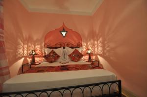 Cama o camas de una habitación en Riad La Famille
