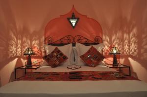 Cama o camas de una habitación en Riad La Famille
