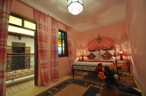 Cama o camas de una habitación en Riad La Famille