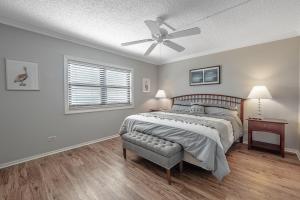 Postel nebo postele na pokoji v ubytování The Islander - 2D by Sea Scape Properties