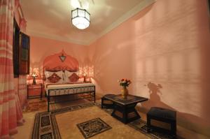 Cama o camas de una habitación en Riad La Famille