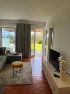 TV a/nebo společenská místnost v ubytování Discovery 1