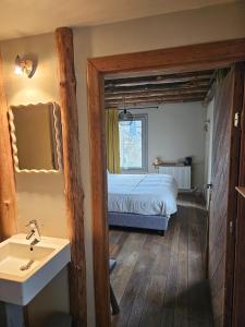 Postel nebo postele na pokoji v ubytování Buteo chambres d'hôtes & espresso