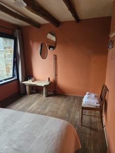 Postel nebo postele na pokoji v ubytování Buteo chambres d'hôtes & espresso