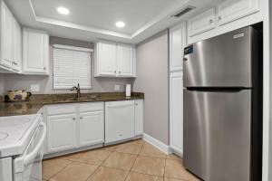 Kuchyň nebo kuchyňský kout v ubytování The Islander - 4C by Sea Scape Properties