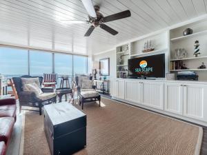 TV a/nebo společenská místnost v ubytování The Islander - 6B by Sea Scape Properties + 26 fotografií