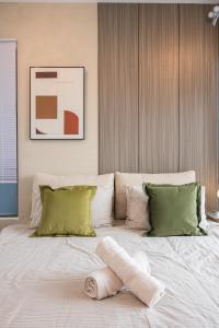 Ένα ή περισσότερα κρεβάτια σε δωμάτιο στο Serene Zen Family Retreat 2 to 7pax&Sunrise View