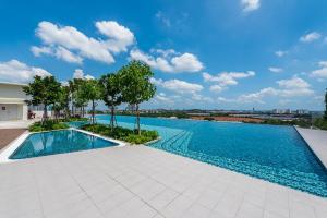 an image of a swimming pool at a house at Setia Alam Executive Suite Walking Distance Convention Centre in Setia Alam