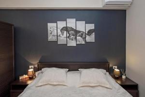 Voodi või voodid majutusasutuse Hotel Season toas