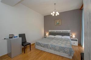 Voodi või voodid majutusasutuse Hotel Season toas