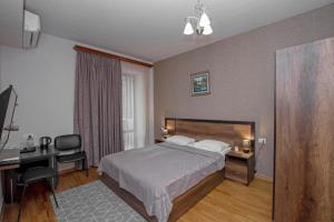 Voodi või voodid majutusasutuse Hotel Season toas