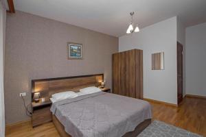 Voodi või voodid majutusasutuse Hotel Season toas