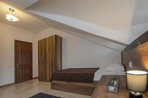 Voodi või voodid majutusasutuse Hotel Season toas