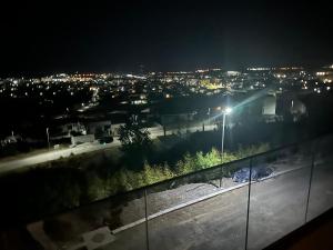 a view of a city at night at NIKA The architect DIAMOND OF GEVGELIA in Gevgelija