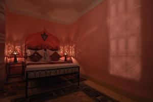 Cama o camas de una habitación en Riad La Famille