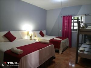 Voodi või voodid majutusasutuse Hotel Vista del Mar toas