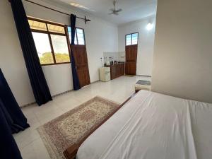 Imagem da galeria de Michamvi Biman Apartments em Michamvi