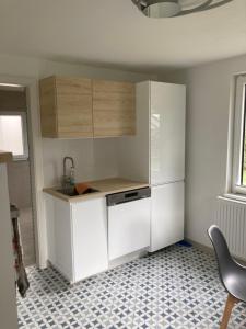 Kuchyň nebo kuchyňský kout v ubytování Tiny House in Leoben