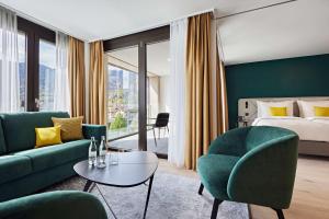 Χώρος καθιστικού στο Essential by Dorint Interlaken - New Opening