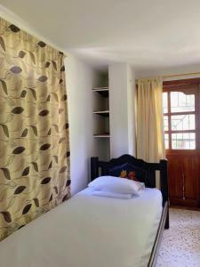 Postel nebo postele na pokoji v ubytování Hotel Villa Mary apartaestudios playa