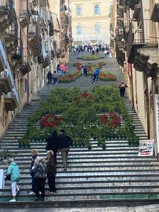 Hostia v ubytovaní Casa vacanza La Ninfea intera casa