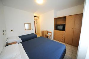 Posteľ alebo postele v izbe v ubytovaní Hp Fly Hotel Bologna