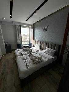 Voodi või voodid majutusasutuse Hotel Cleopatra Pyramids View toas