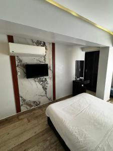 Voodi või voodid majutusasutuse Hotel Cleopatra Pyramids View toas