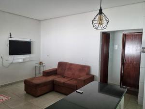 Μια τηλεόραση ή/και κέντρο ψυχαγωγίας στο Casa Mobiliada ate 10 pessoas 3 QUARTOS Aragarças Go