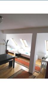 Postel nebo postele na pokoji v ubytování Vienna Rooms Nr 14