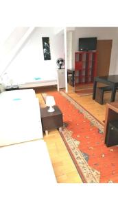 TV a/nebo společenská místnost v ubytování Vienna Rooms Nr 14