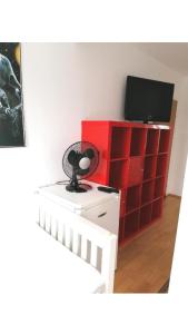 TV a/nebo společenská místnost v ubytování Vienna Rooms Nr 14
