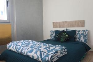 Postel nebo postele na pokoji v ubytování Grand Appartement Rooftop Kenitra