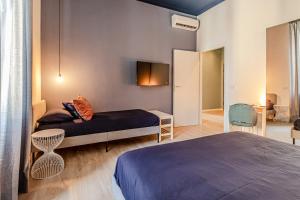 Ένα ή περισσότερα κρεβάτια σε δωμάτιο στο Moonlight Stylish Central, Hospital & Station