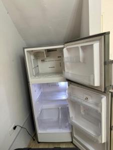 Kuchyň nebo kuchyňský kout v ubytování Apartamento 2 calles de la plaza principal