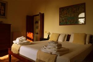 Ένα ή περισσότερα κρεβάτια σε δωμάτιο στο SassiNeri Country House +27 φωτογραφίες