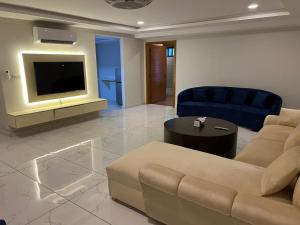 TV a/nebo společenská místnost v ubytování The Majestic - 1BHK - Self Check In