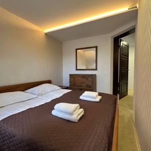 Posteľ alebo postele v izbe v ubytovaní GORGANY resort & SPA