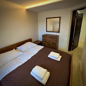 Posteľ alebo postele v izbe v ubytovaní GORGANY resort & SPA